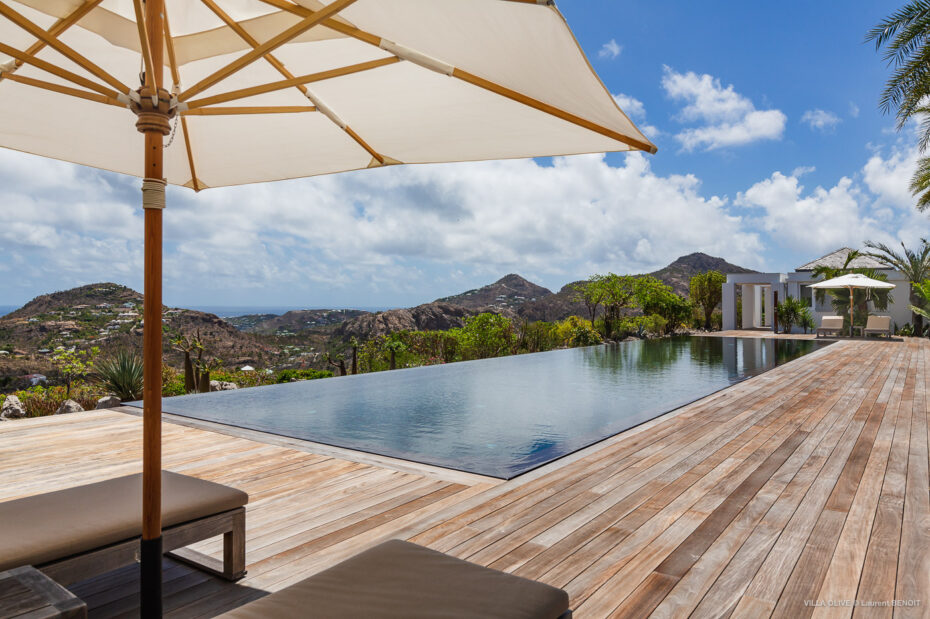 Villa Olive sun deck and infinity-edge pool at midday
